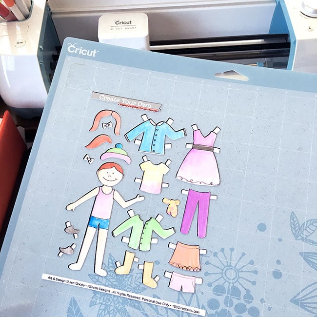 Cut out the paper doll PNG with your Cricut machine