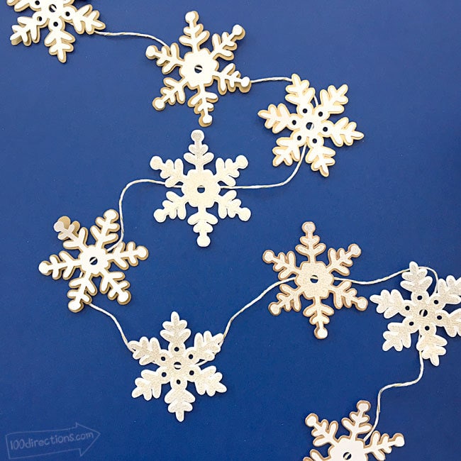 DIY Snowflake garland made with Cricut designed by Jen Goode