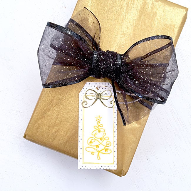 Hand-drawn gold tree gift tag designed by Jen Goode