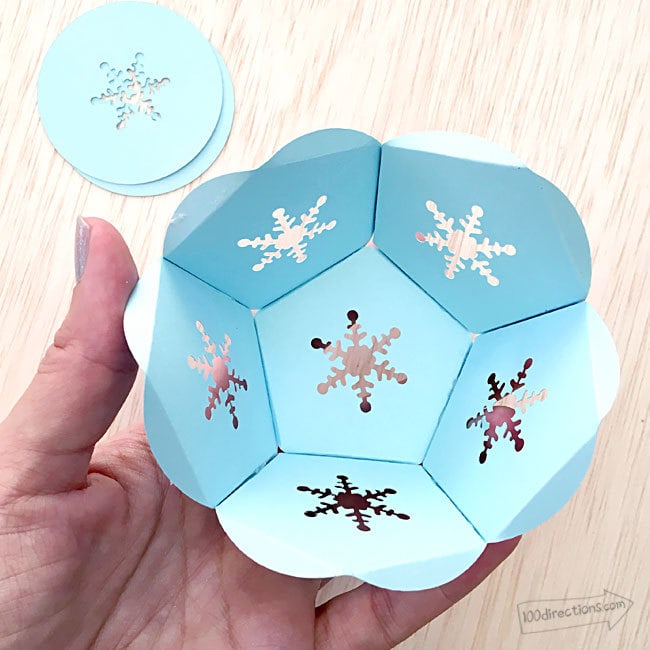 Glue folded edges together to create your paper snowball