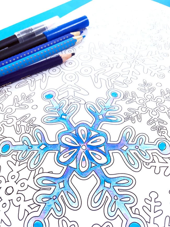 Coloring a snowflake coloring page