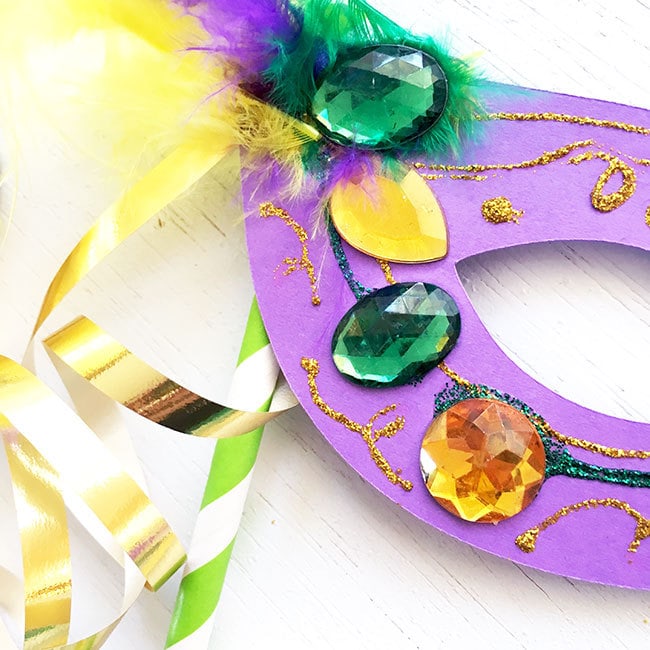 Add ribbon and feathers for more Mardi Gras fun