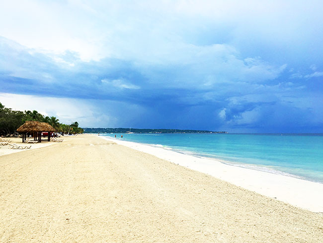 Take a stroll along the beach at Beaches Resorts in Negril, Jamaica 