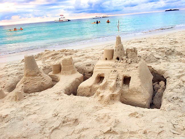 Building sandcastles at Beaches Resorts in Negril, Jamaica 