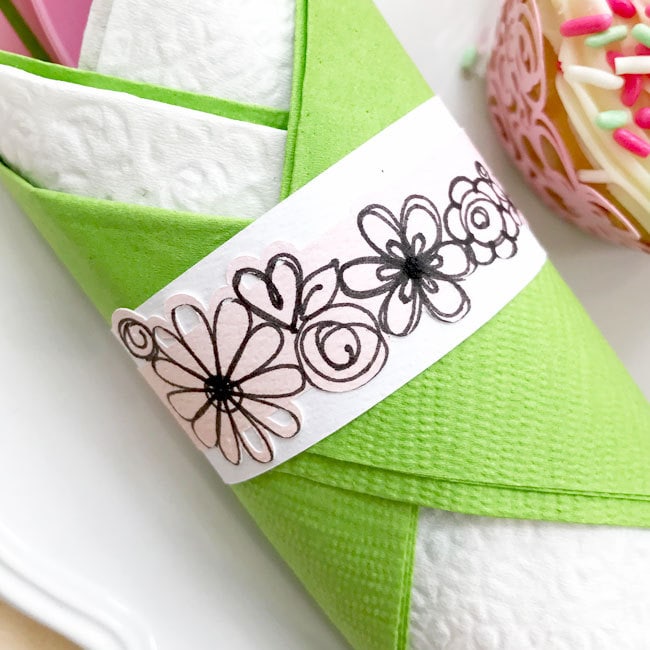 Close up of Floral art napkin ring made with Cricut designed by Jen Goode