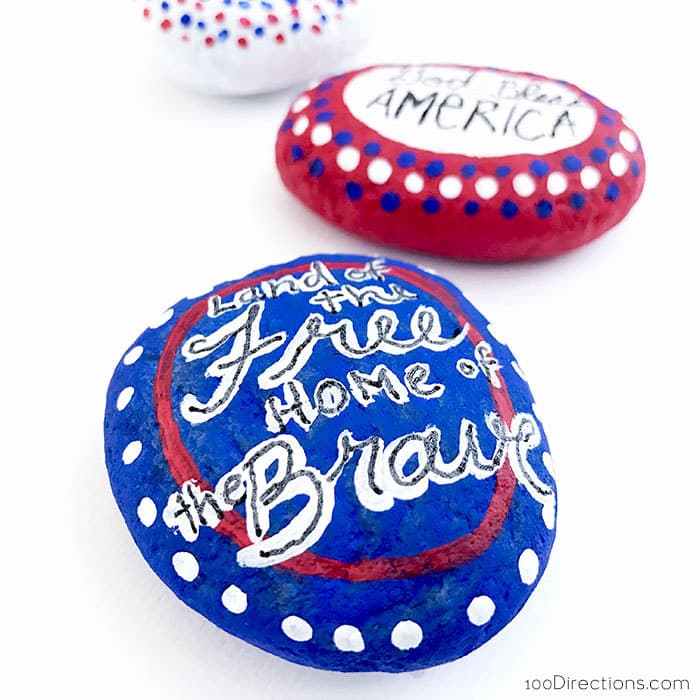 Use a permanent black pen to write or doodle on your painted rocks