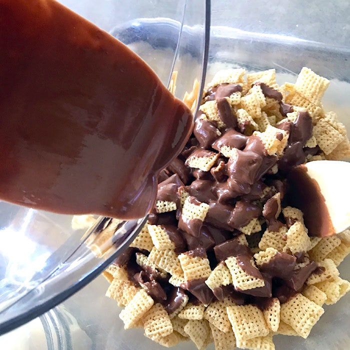 Melt the chocolate chips and pour over Chex cereal