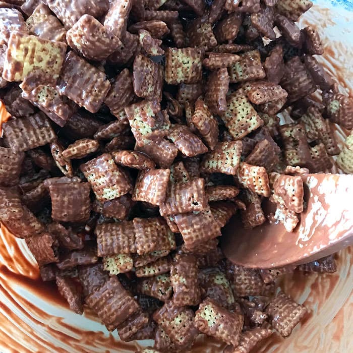 Stir melted chocolate into cereal
