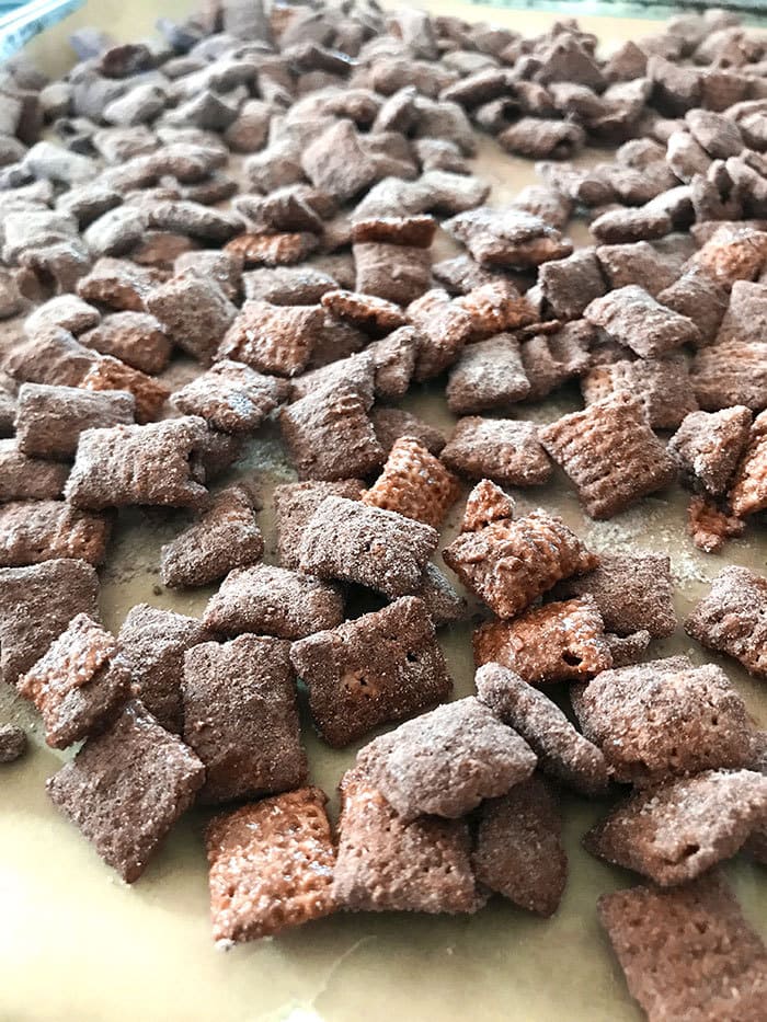 Coat in hot cocoa powder and spread on cookie sheet