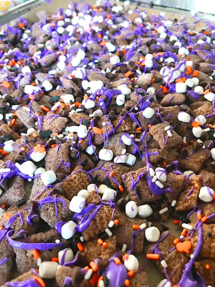 Drizzle purple almond bark cover n sprinkles and let cool