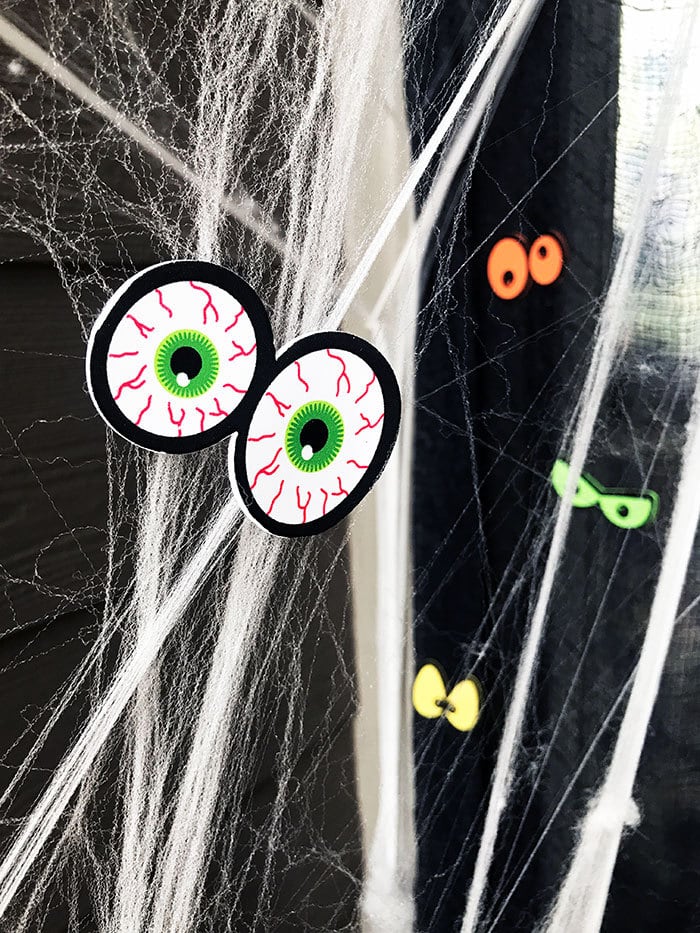 Eyeball stickers work great on fake spiderwebs