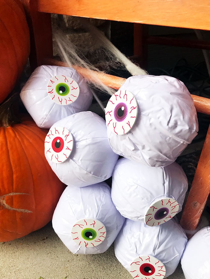 Use mini beachballs and eyeball stickers for fun eyeball decor