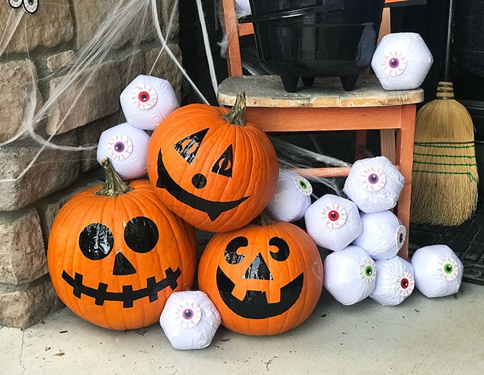 Decorate pumpkins with vinyl to make easy jack-o-lanterns