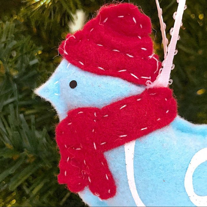 Detail stitching for a DIY winter bird ornament designed by Jen Goode