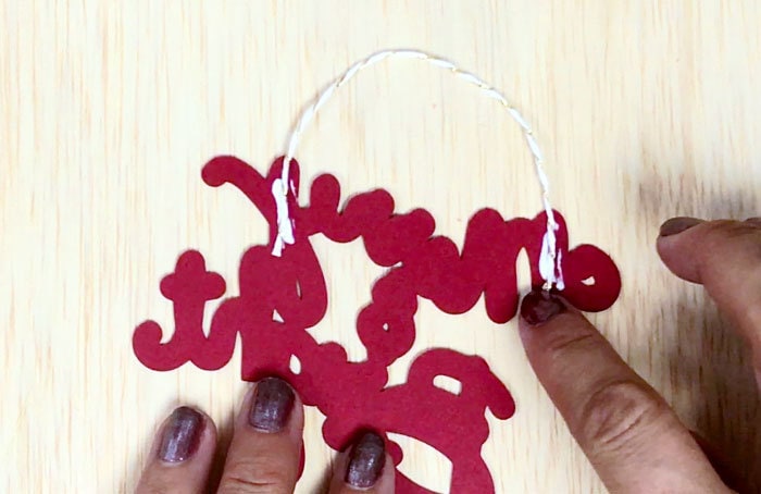 Use twine to create a hanging loop for your ornaments