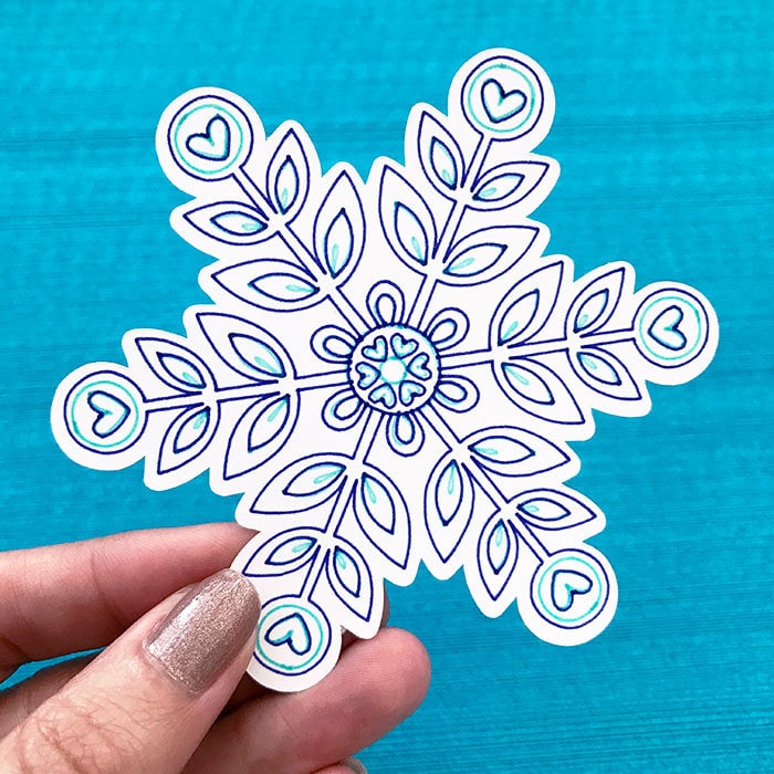 Make gift tags with snowflake drawings designed by Jen Goode