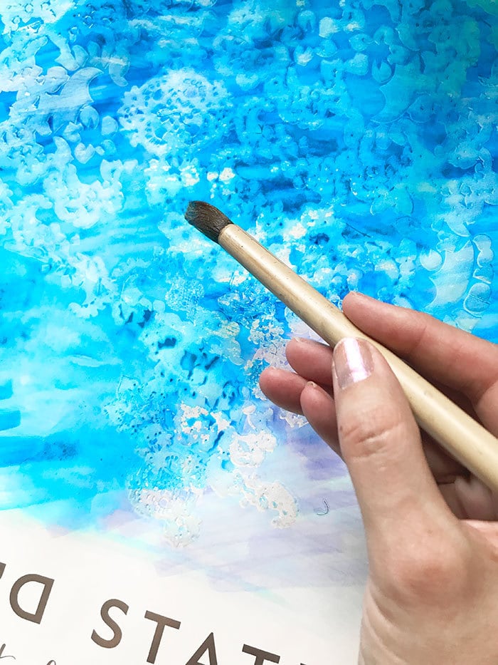 paint water over the marker color to create a watercolor look