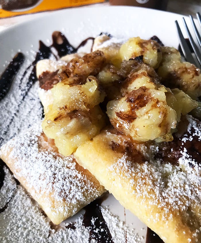 Chocolate drizzled banana beignets