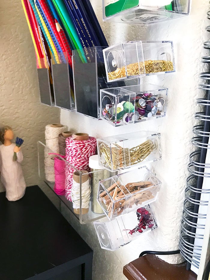 Mini storage boxes hanging on the wall with magnets
