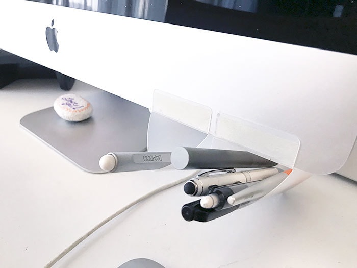Pen holder on computer monitor