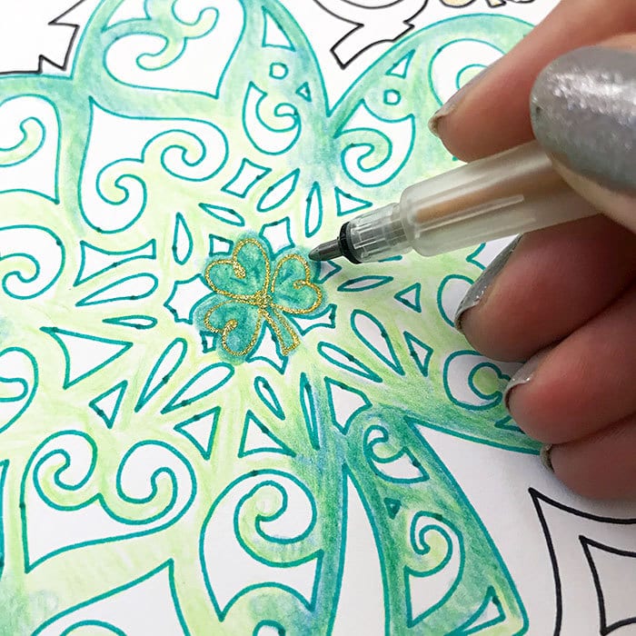 Add gold accents to Shamrock Coloring Pages with gold glitter pens