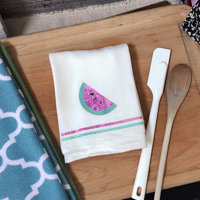 make pretty hand towels in minutes with your Cricut machine and patterned iron-on vinyl 