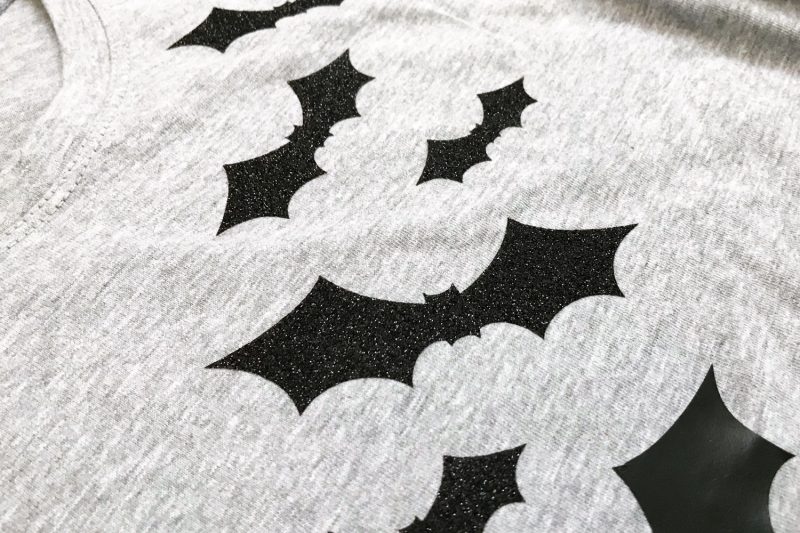 Use black or black glitter iron-on vinyl to create this fun shirt design