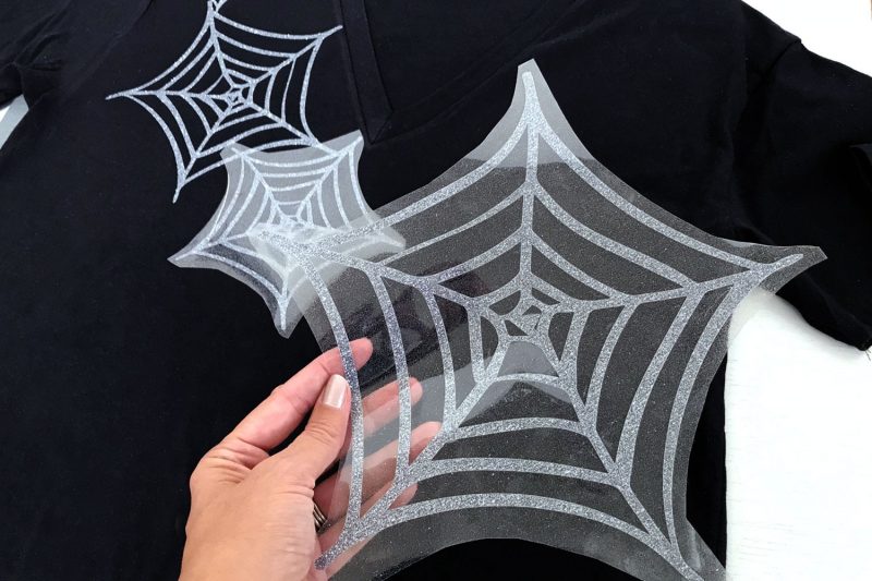 Cut multiple spider webs with glitter iron-on vinyl