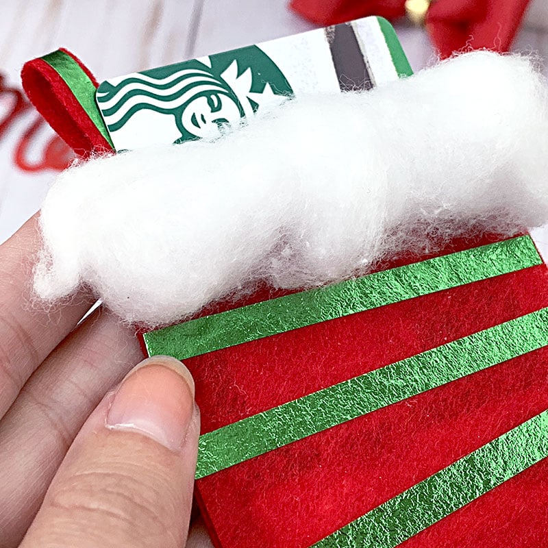 Use cotton balls to add a fun fluffy layer to the top of your mini stockings