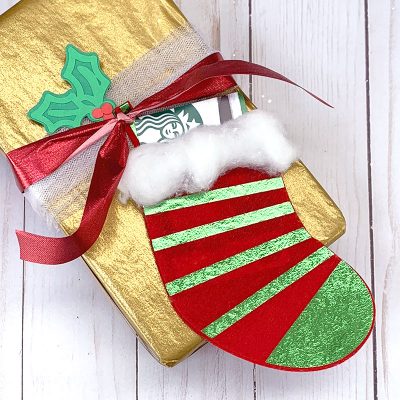 Make a mini stocking gift card holder in just minutes. This is a cute Cricut Craft designed by Jen Goode