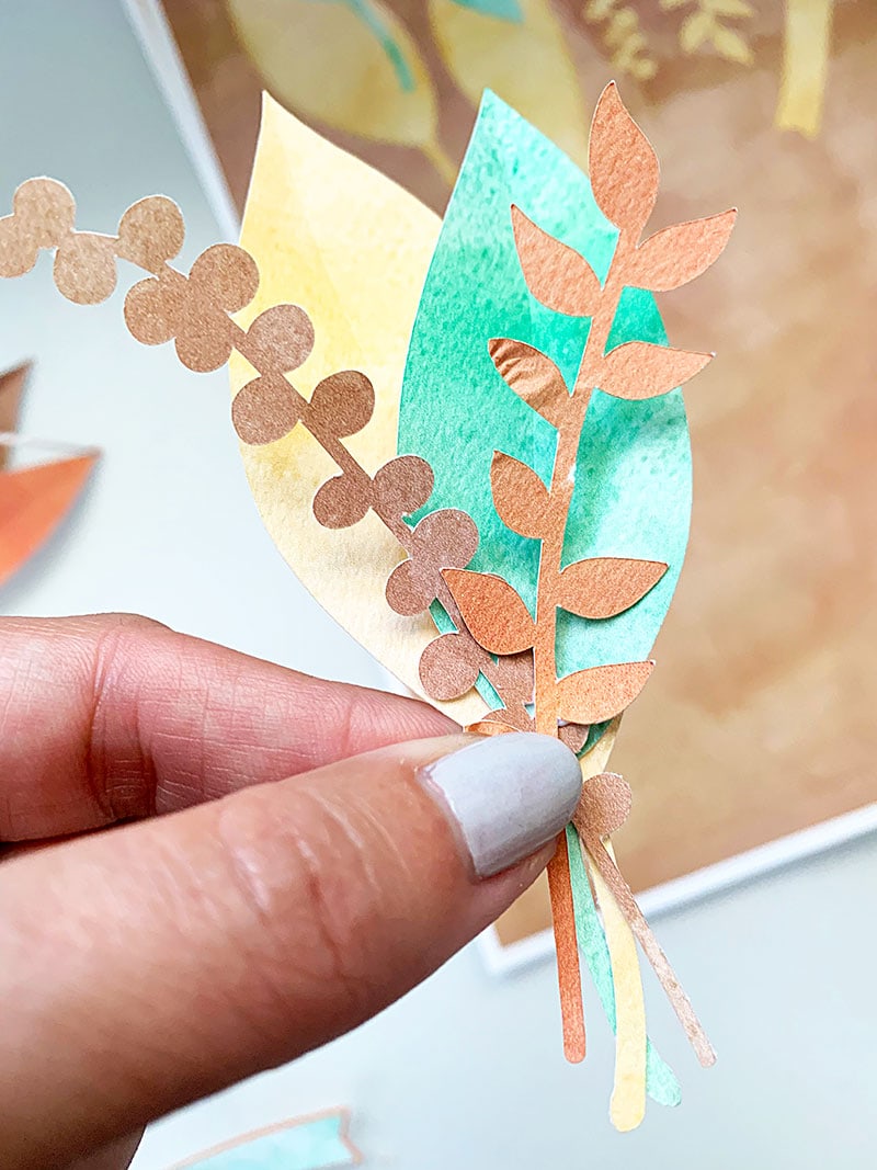 Add more pretty cut outs to create your design