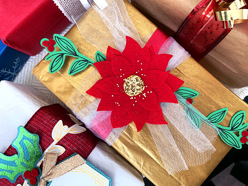 Choose a color theme for your gift wrap - red, green and gold is a classic color combo