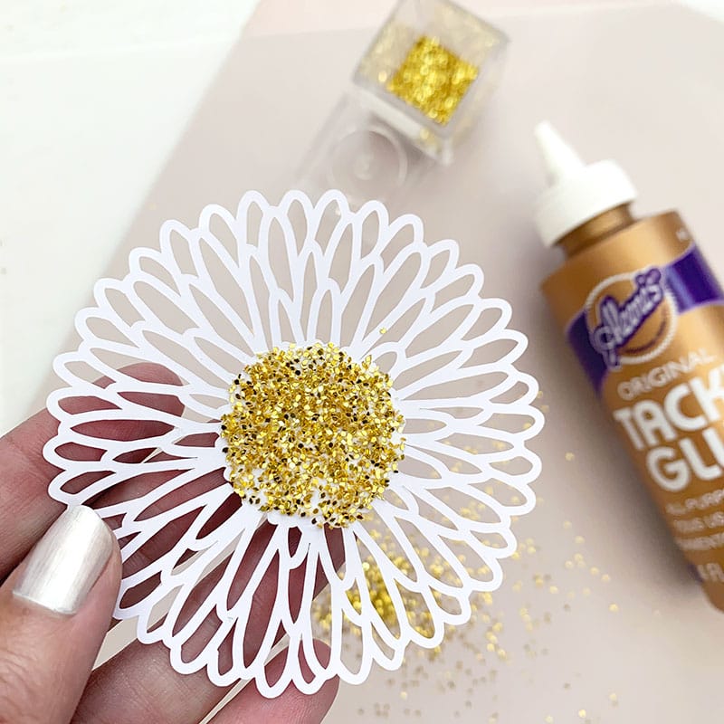 Small flower cutout with glitter center