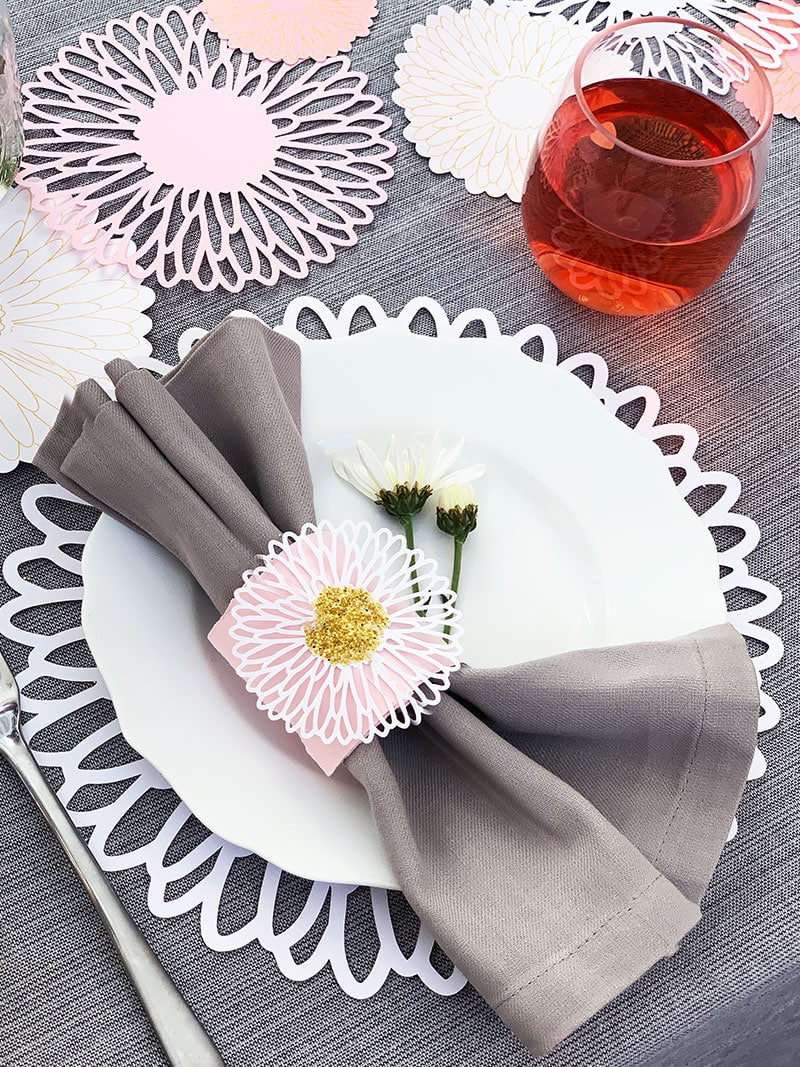 set up each place setting with pretty cutouts and fresh flowers