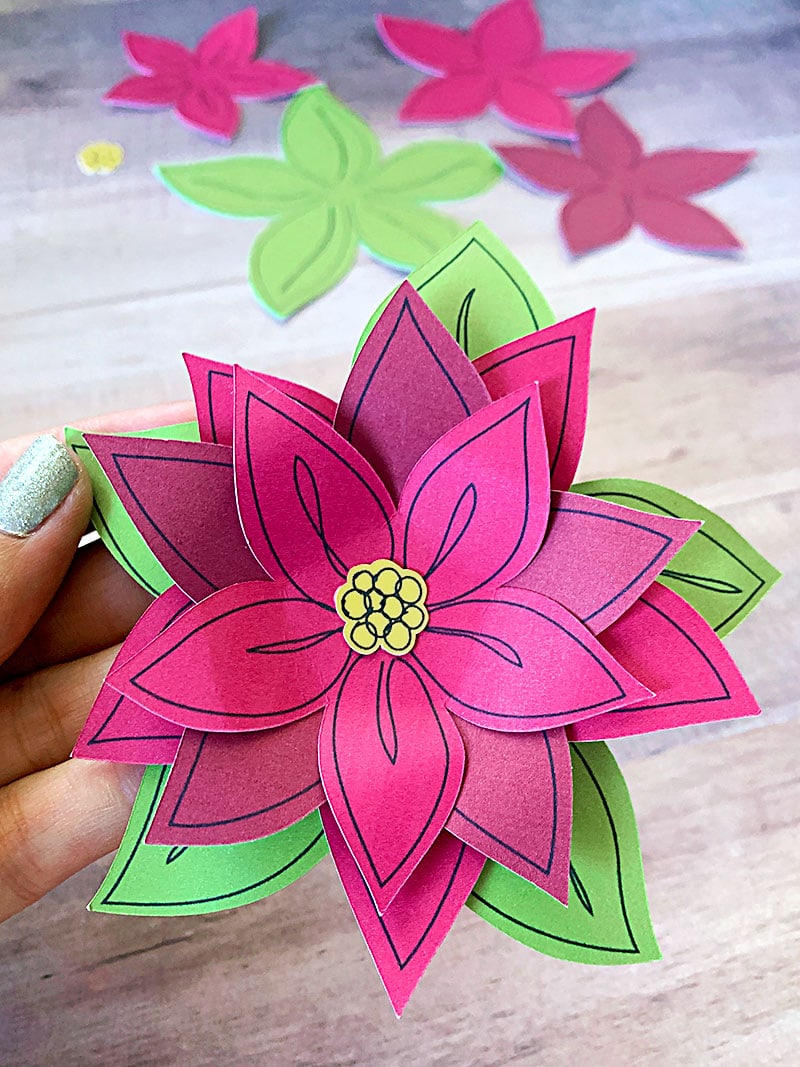Make a pretty poinsettia flower Christmas gift topper with your Cricut - design by Jen Goode