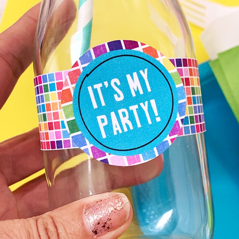 Add fun party decor to drink bottles