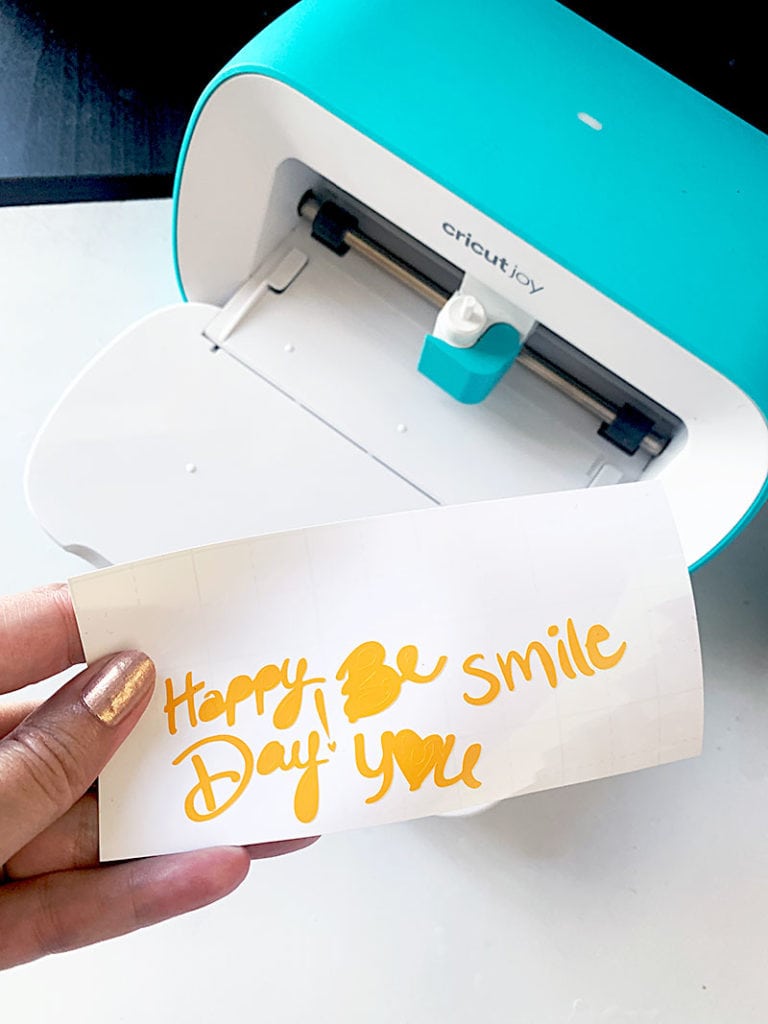 Cut vinyl words with your Cricut to create fun word art rocks