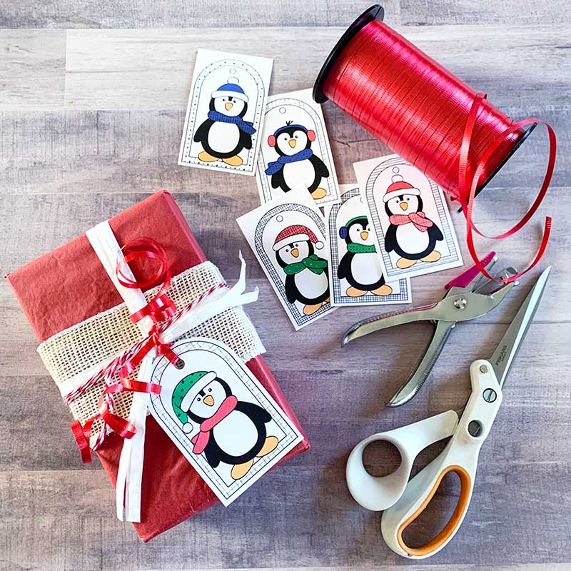 Make your own cute Christmas gift tags with adorable penguin designs by Jen Goode