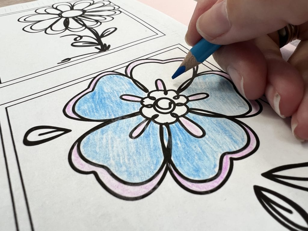 Coloring floral art with colored pencils