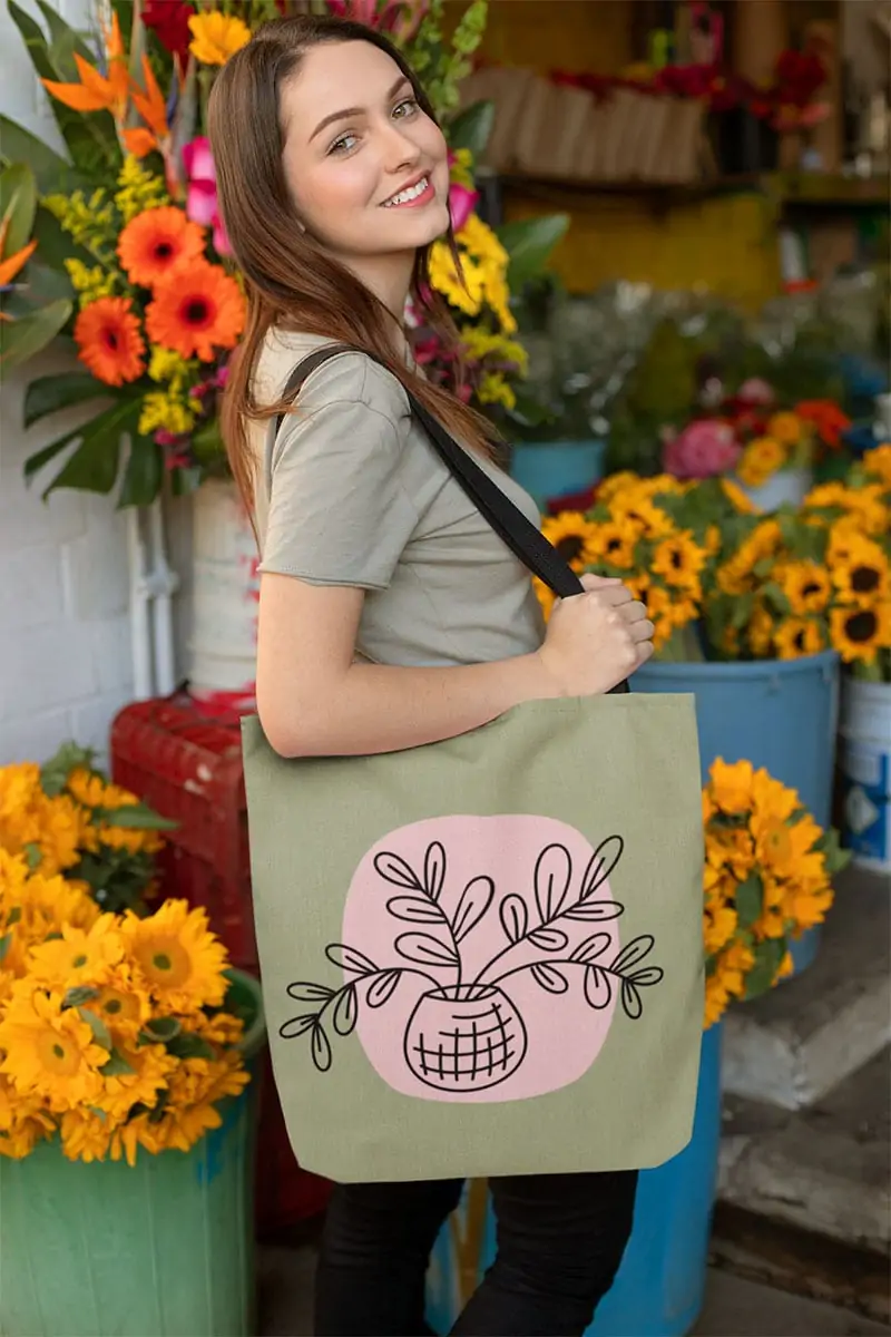 Make your own cute tote bag featuring a fun plant SVG design and your Cricut - art by Jen Goode