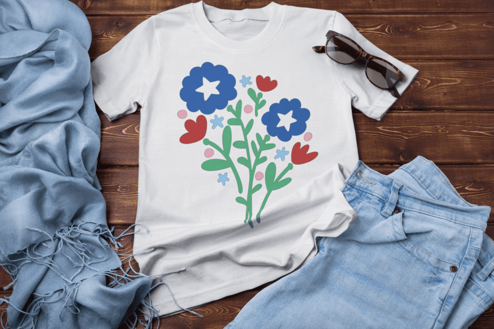 Red, white and blue flower cut file design on a t-shirt by Jen Goode