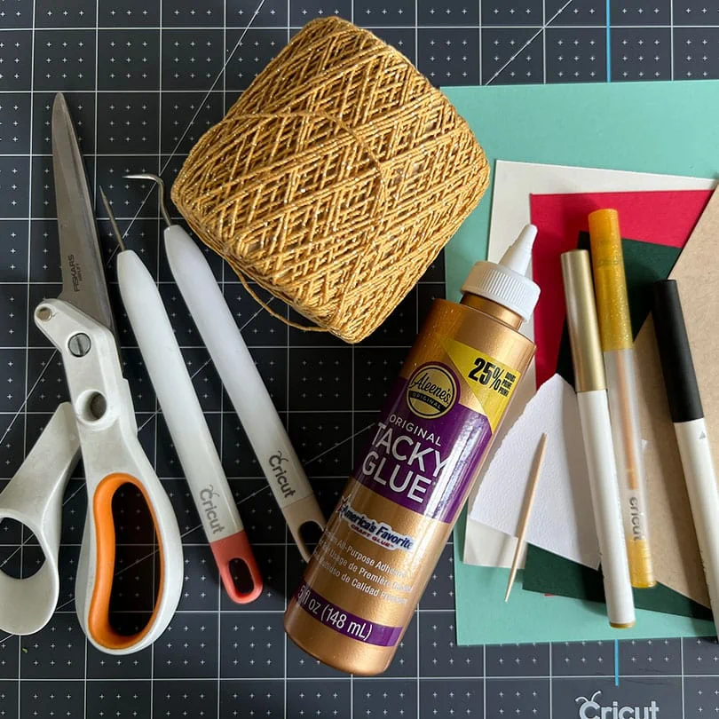 Supplies needed to make holiday gift tags with your Cricut