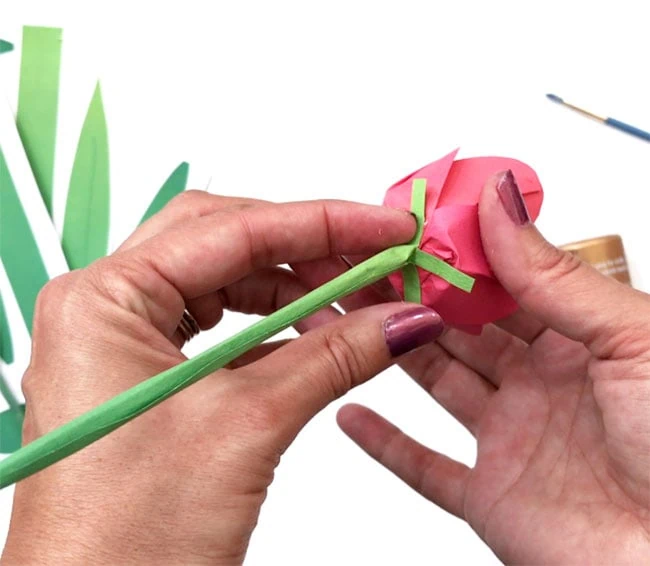 Craft paper stem and attach to bottom of paper tulip flower