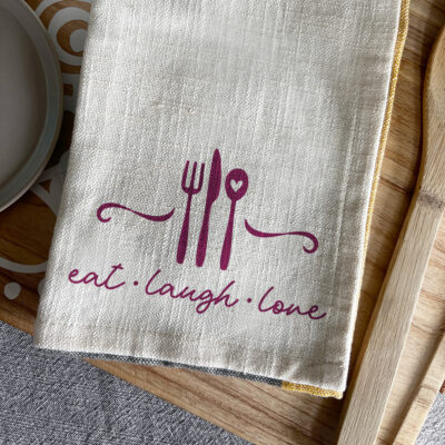 Kitchen tea towel crafted with a kitchen themed SVG designed by Jen Goode